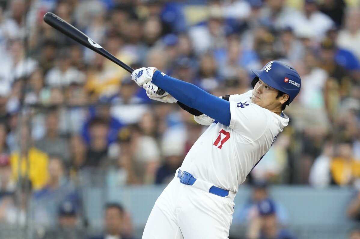 Ohtani hits tying 3-run homer in 2nd at-bat of playoff debut for the Los Angeles Dodgers in NLDS